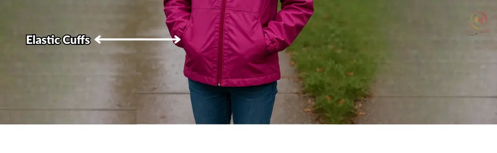 Elastic cuffs and drop tail shown on the Lightweight Waterproof Rain Jacket for Girls