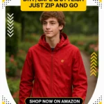 A teenage boy wearing the Best Waterproof Raincoat for Kids Lightweight Hooded Jacket, standing outdoors on a rainy day, showcasing style and weather protection.