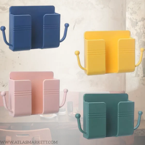 Adhesive phone holder attached near wall socket for safe phone charging