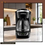 12-cup drip coffee maker with glass carafe placed on a modern kitchen countertop