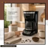 Close-up of digital controls and programmable timer on a 12-cup coffee maker
