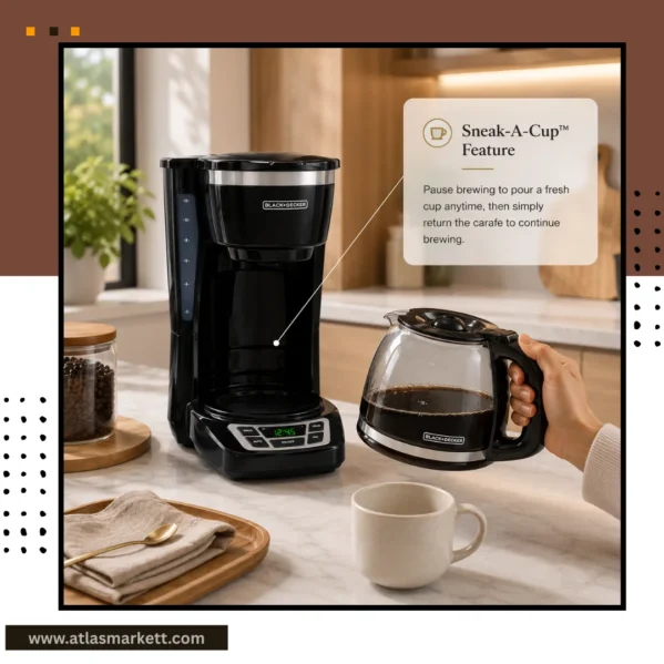 Freshly brewed coffee pouring from a 12-cup drip coffee maker into a ceramic mug
