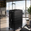 Expandable large travel suitcase showing additional packing space