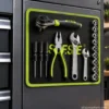 Flexible magnetic tool mat with 83 strong magnets holding metal tools and parts