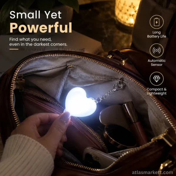Compact heart-shaped LED light for handbags